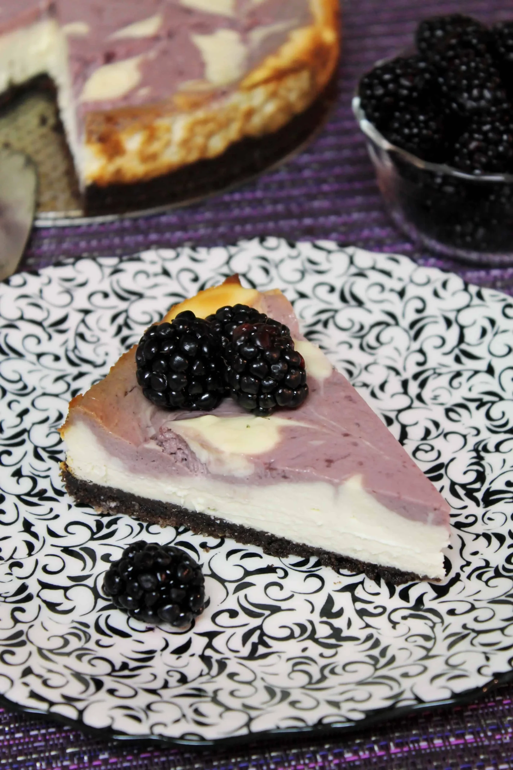 Blackberry Swirl Cheesecake a Gingerbread House