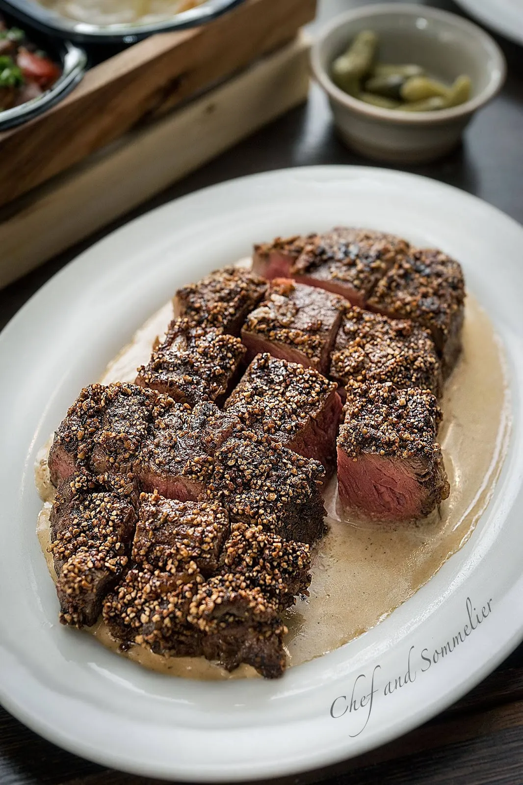Brandy Peppercorn Steak with Root Vegetable Straw