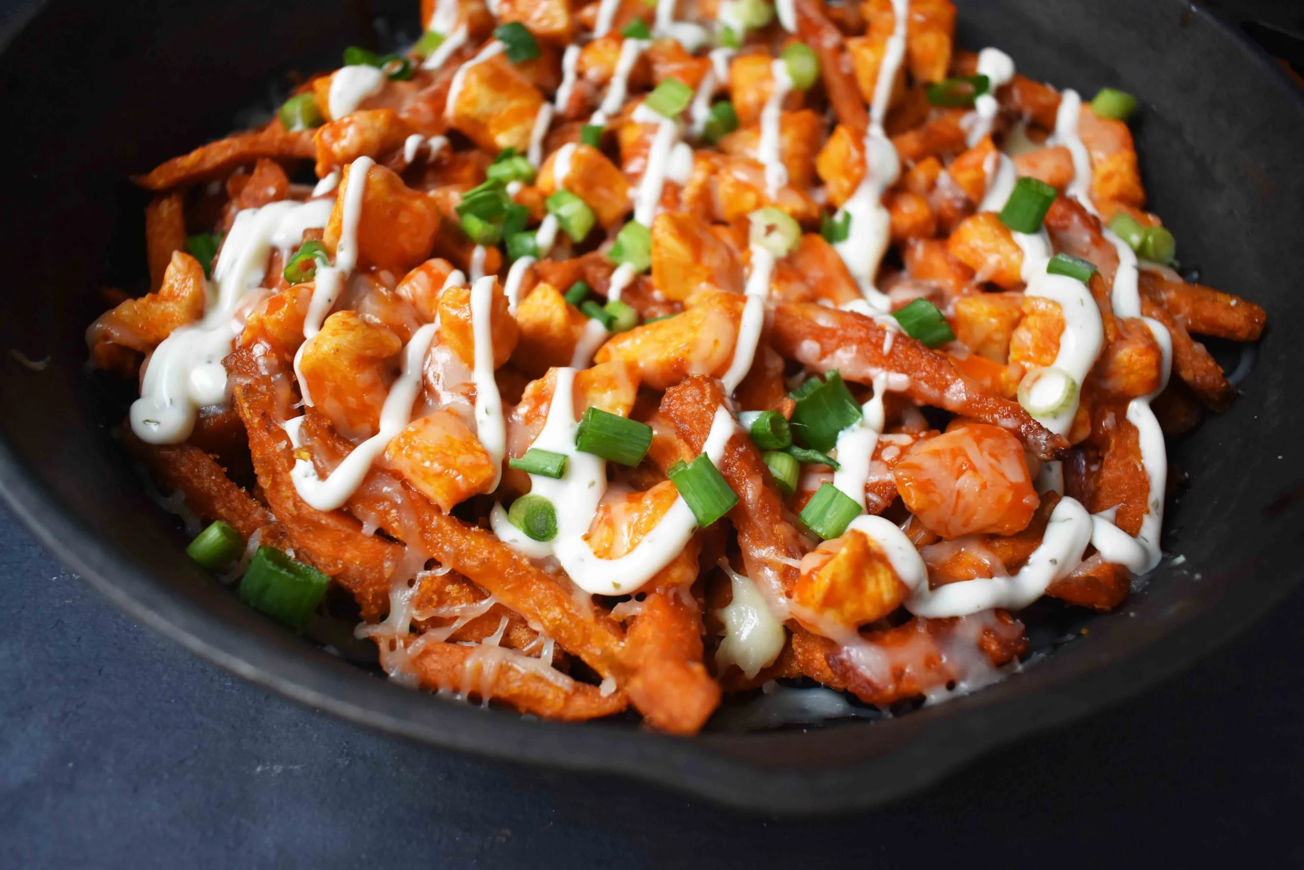 Buffalo Chicken Loaded Baked Sweet Potato Fries