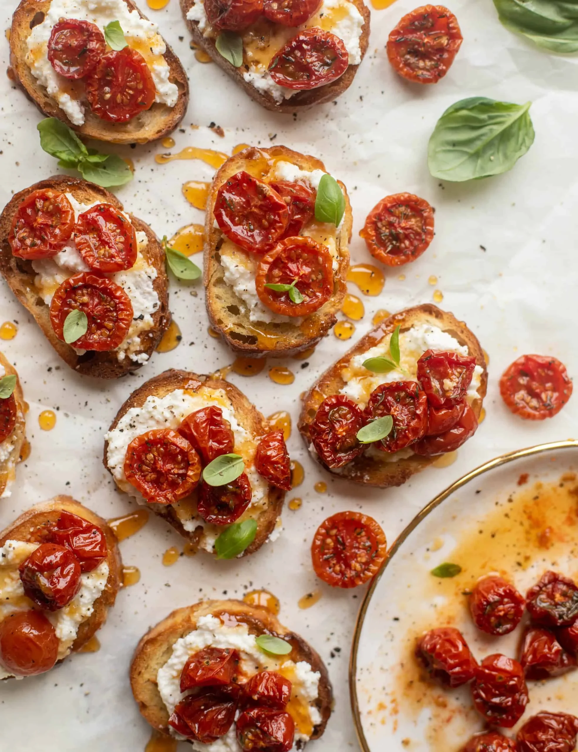 Cheesy Crusted Roasted Tomato Crostini