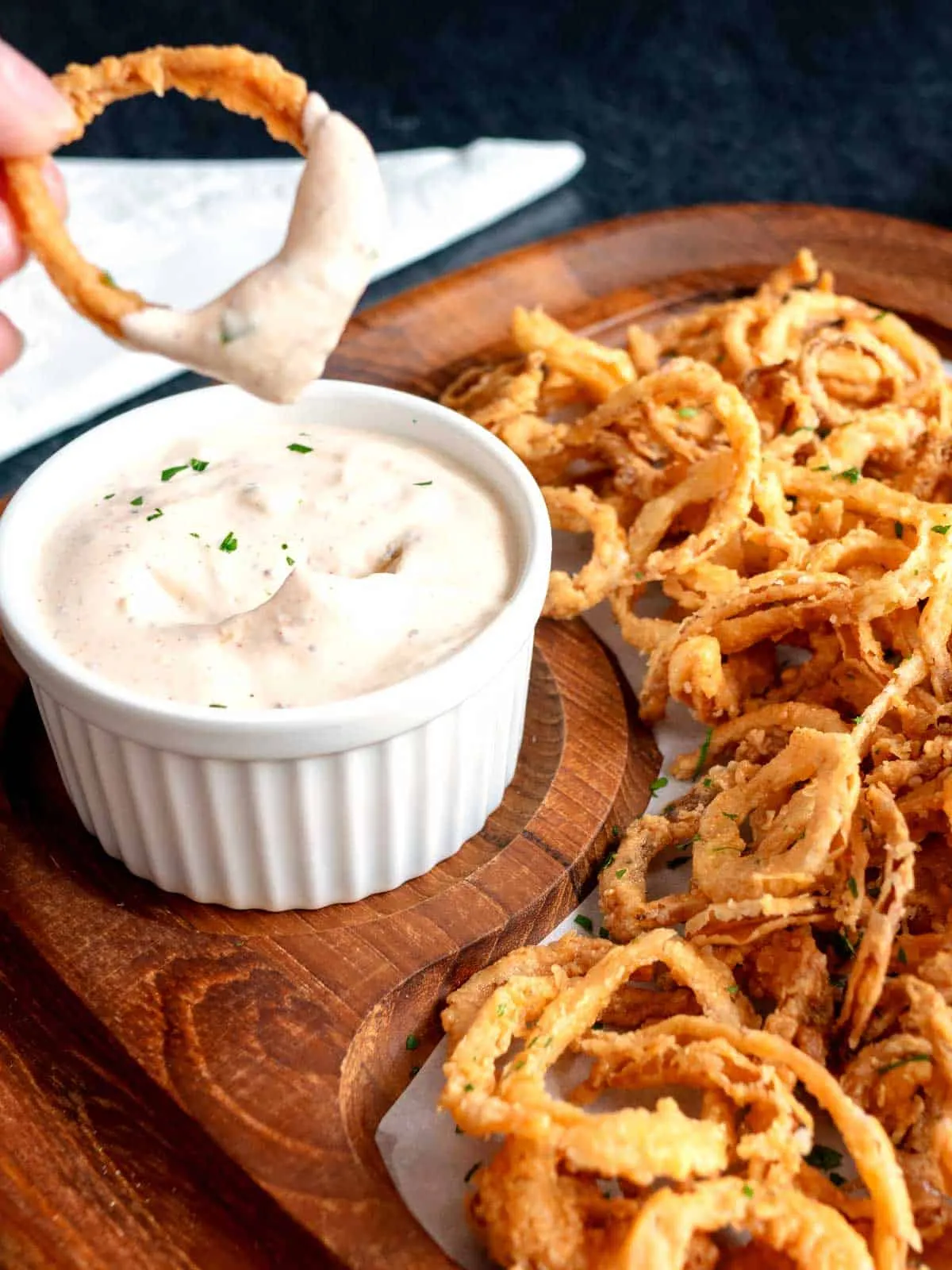Crispy Fried Onion Strings with Spicy Dipping Sauce
