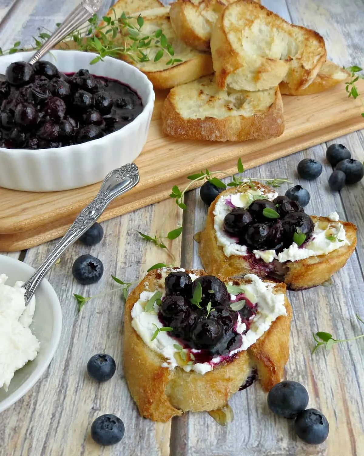 Goat Cheese Crostini with Blueberry and Peach Thyme