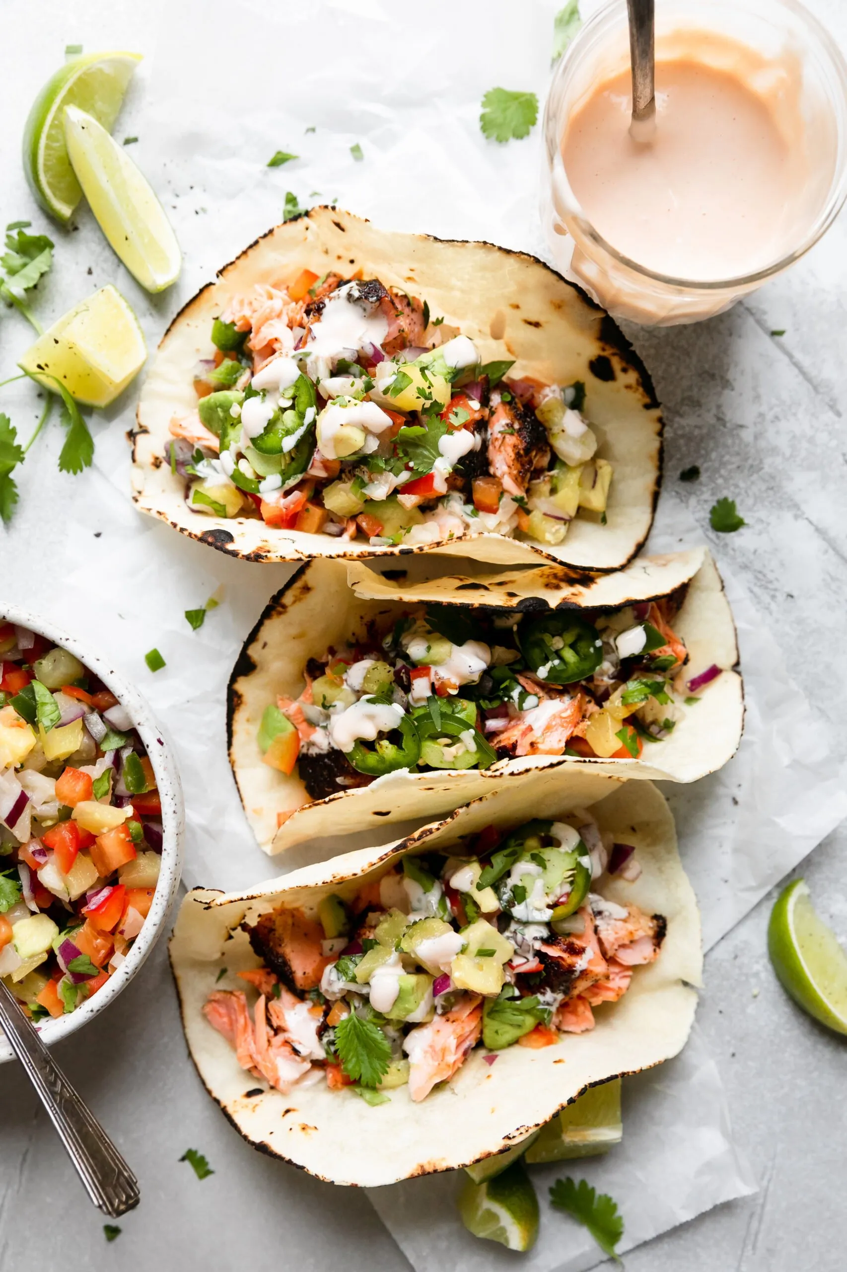 Grilled Spicy Blackened Salmon Tacos with Pineapple Avocado Salsa