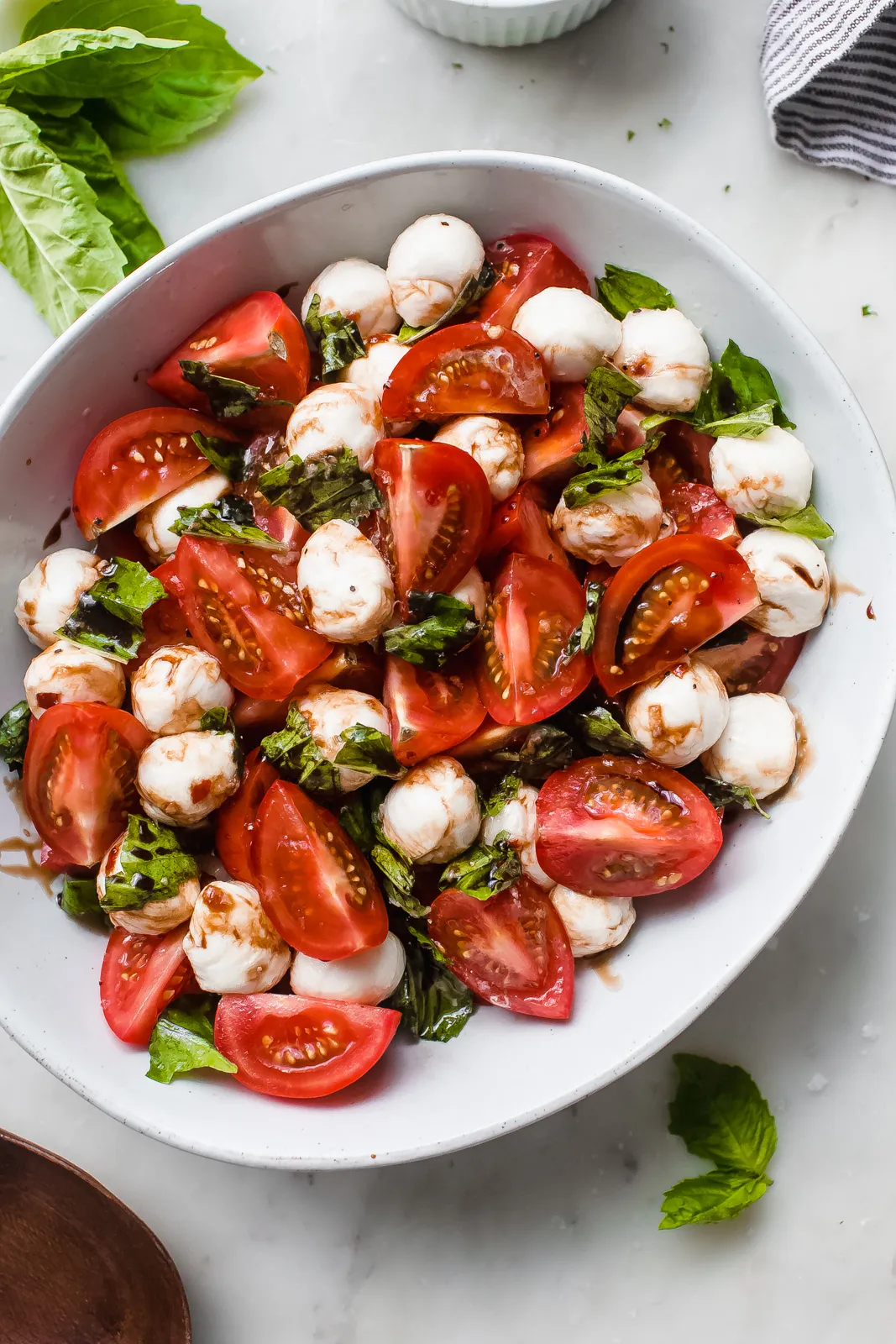 Marinated Mozzarella with Basil and Sun Dried Tomatoes