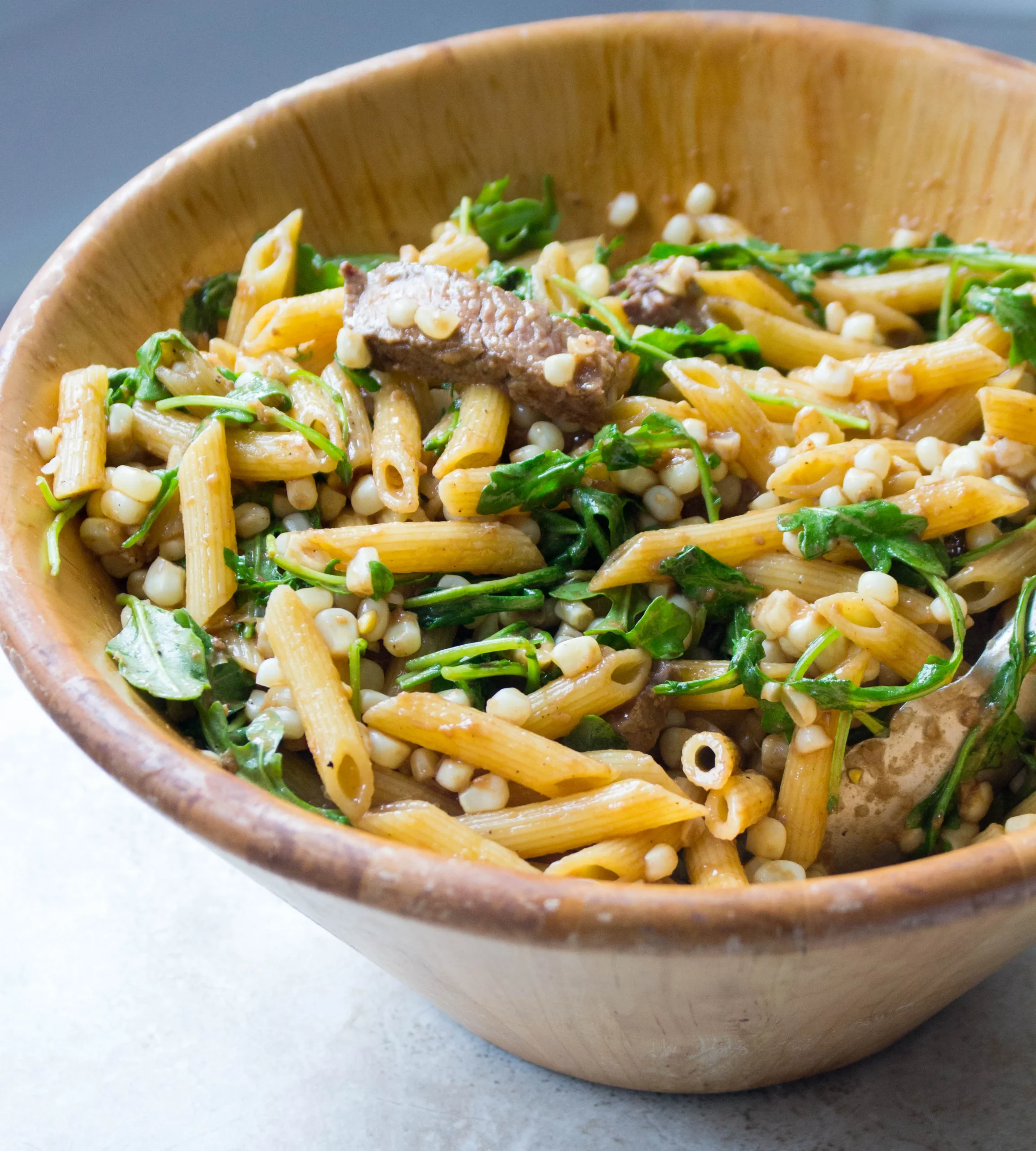 Penne with Steak, Corn, and Arugula