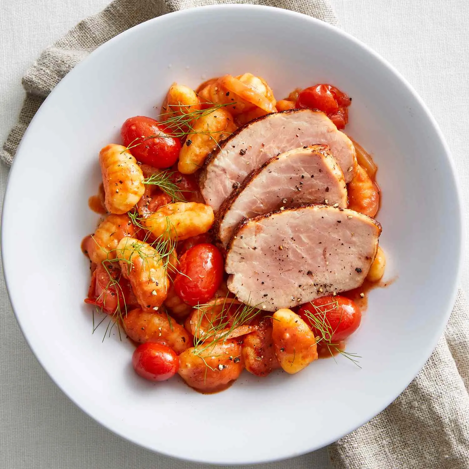 Pork Tenderloin Over Three Cheese Gnocchi
