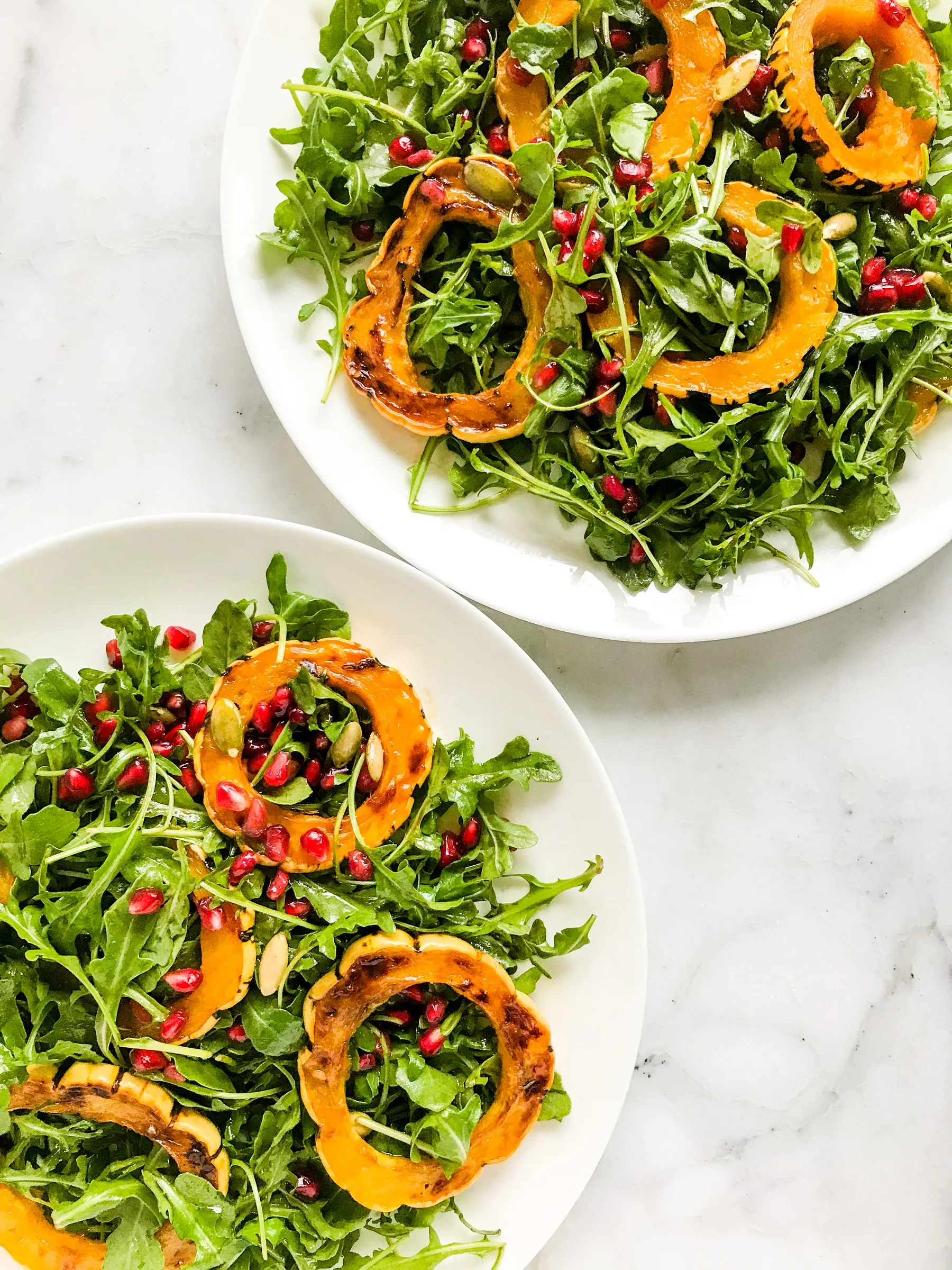 Roasted Delicata Squash Pomegranate Arugula Salad