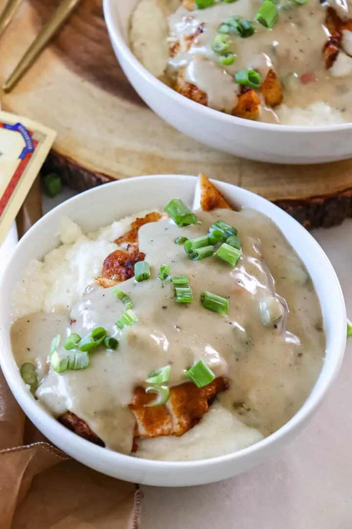 Saucy Smothered Southern Chicken with Parmesan Grits