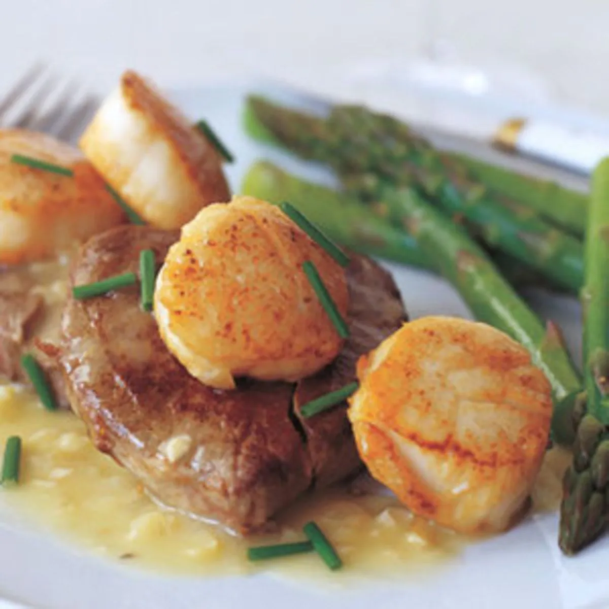 Scallops Tenderloin with Manhattan Sauce Asparagus