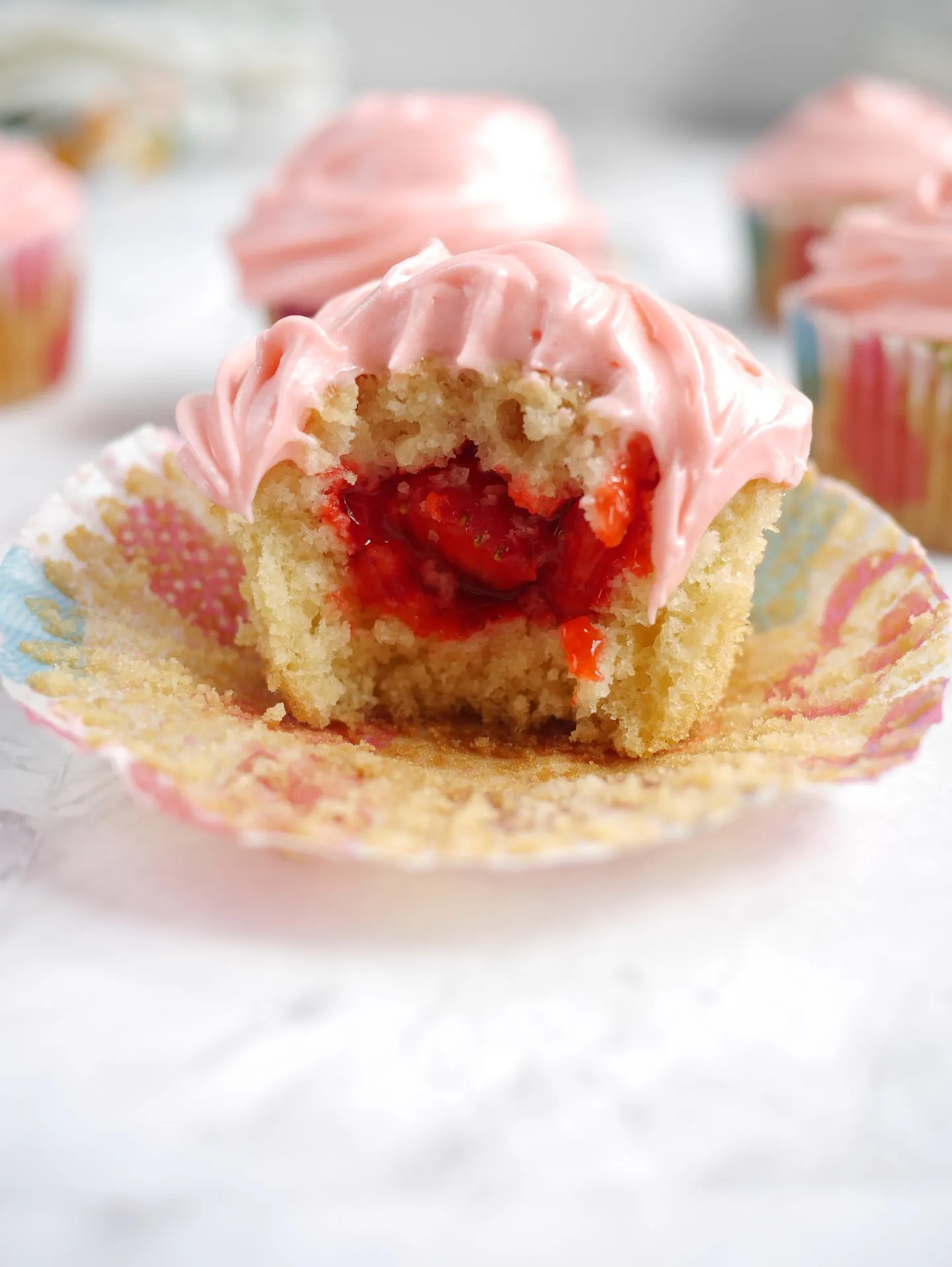 Strawberry Filled Vanilla Cupcakes