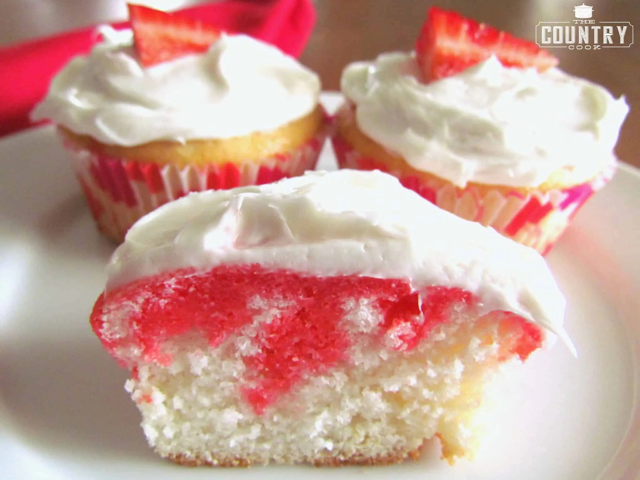 Strawberry Jell-O Poke Cupcakes