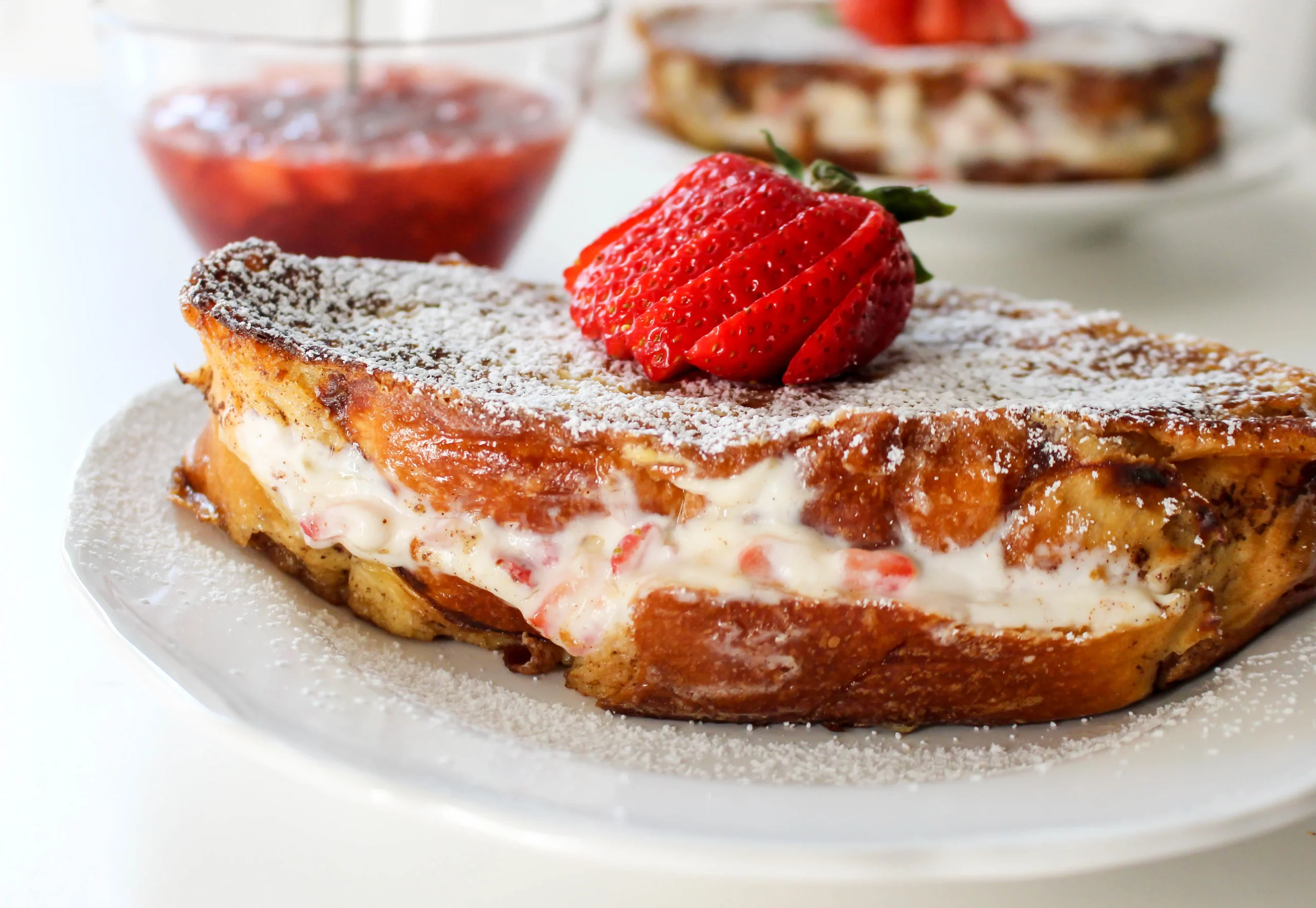 Strawberry and Cream Stuffed Croissant French Toast