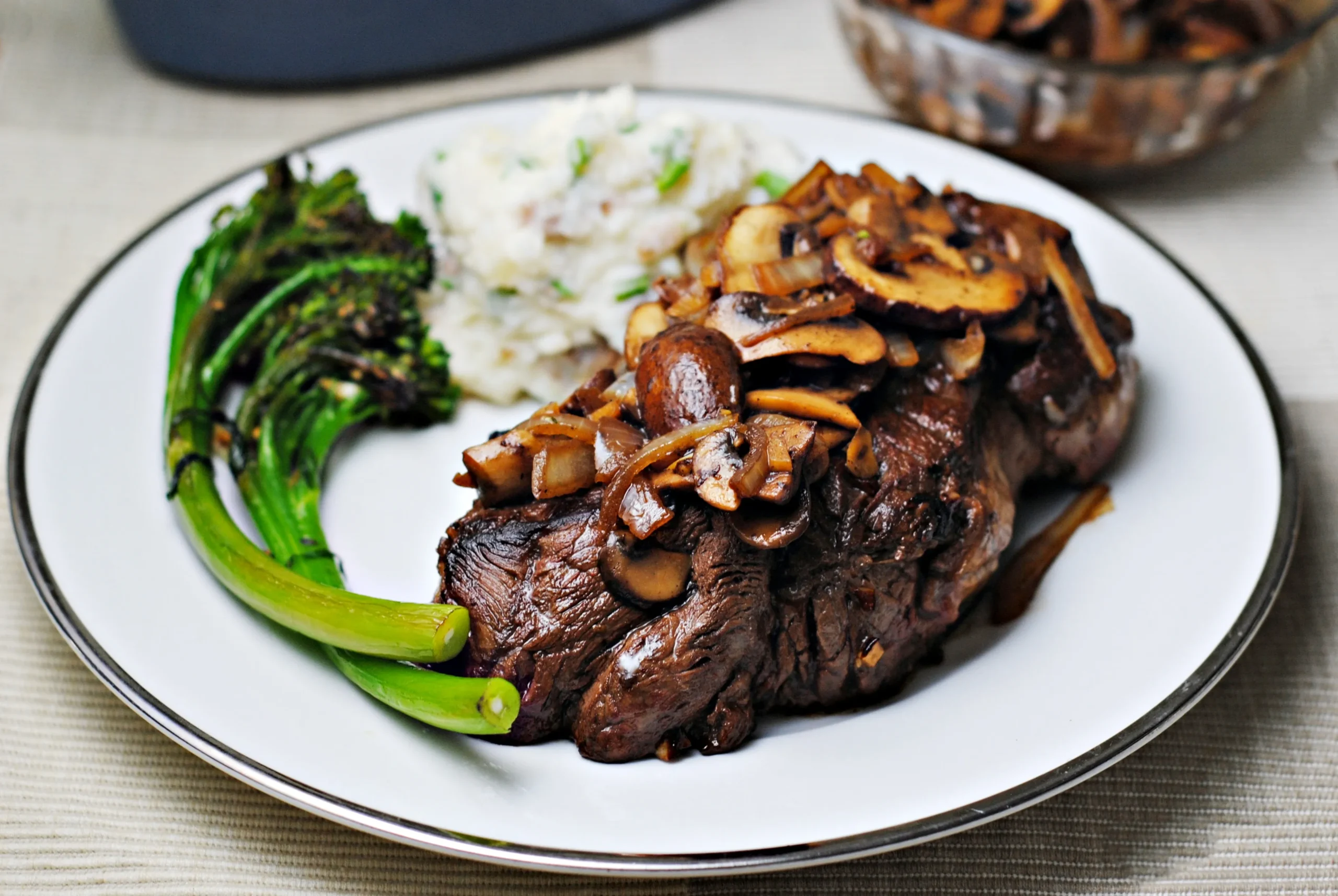 T-Bone Steak Sautéed with Onions