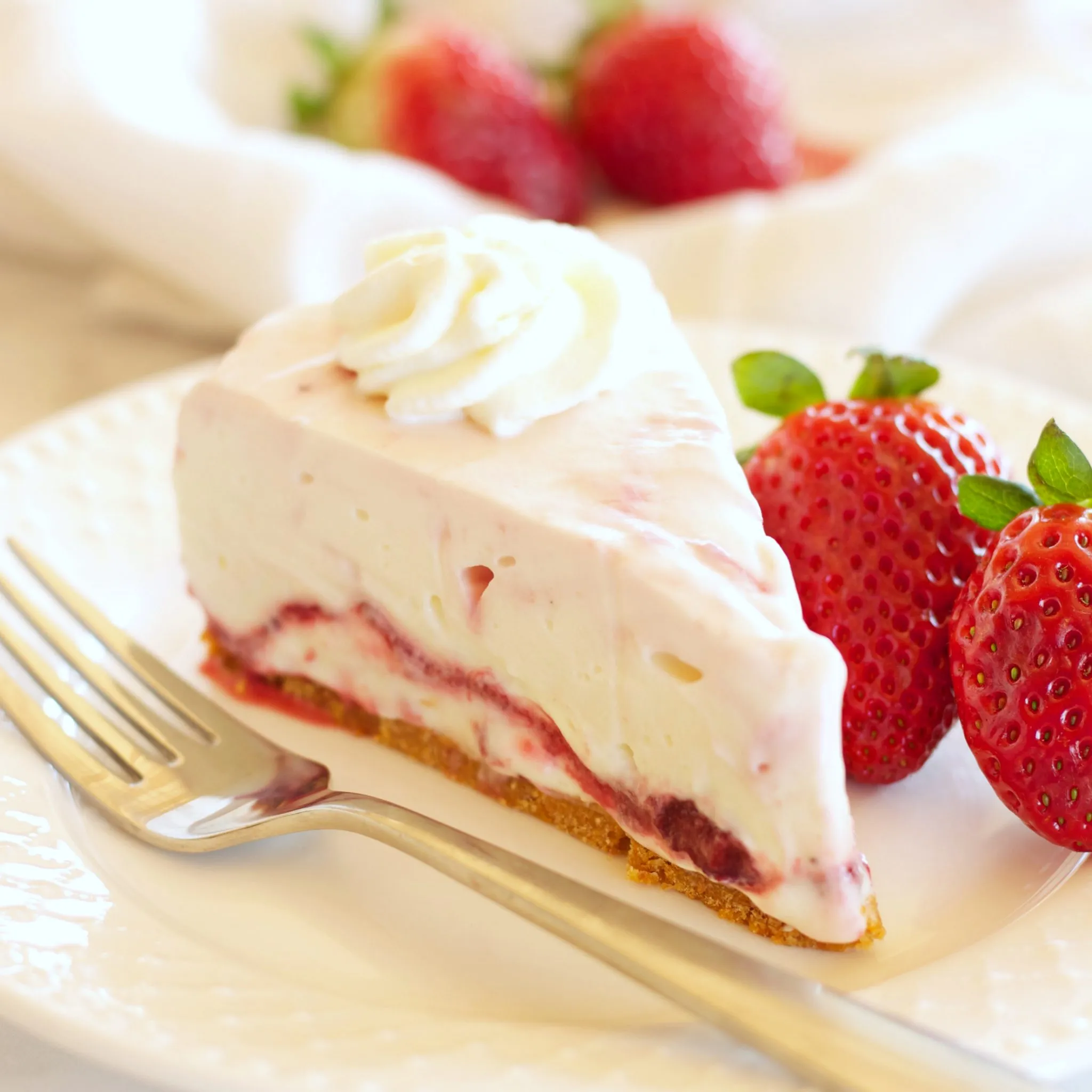 Ultimate Strawberry Swirl Cheesecake