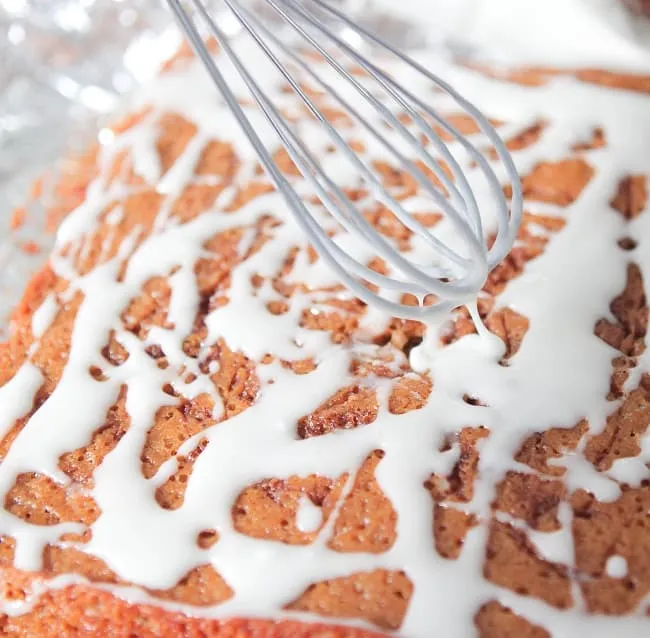 cinnamon roll swirled gingerbread bars with toffee chips