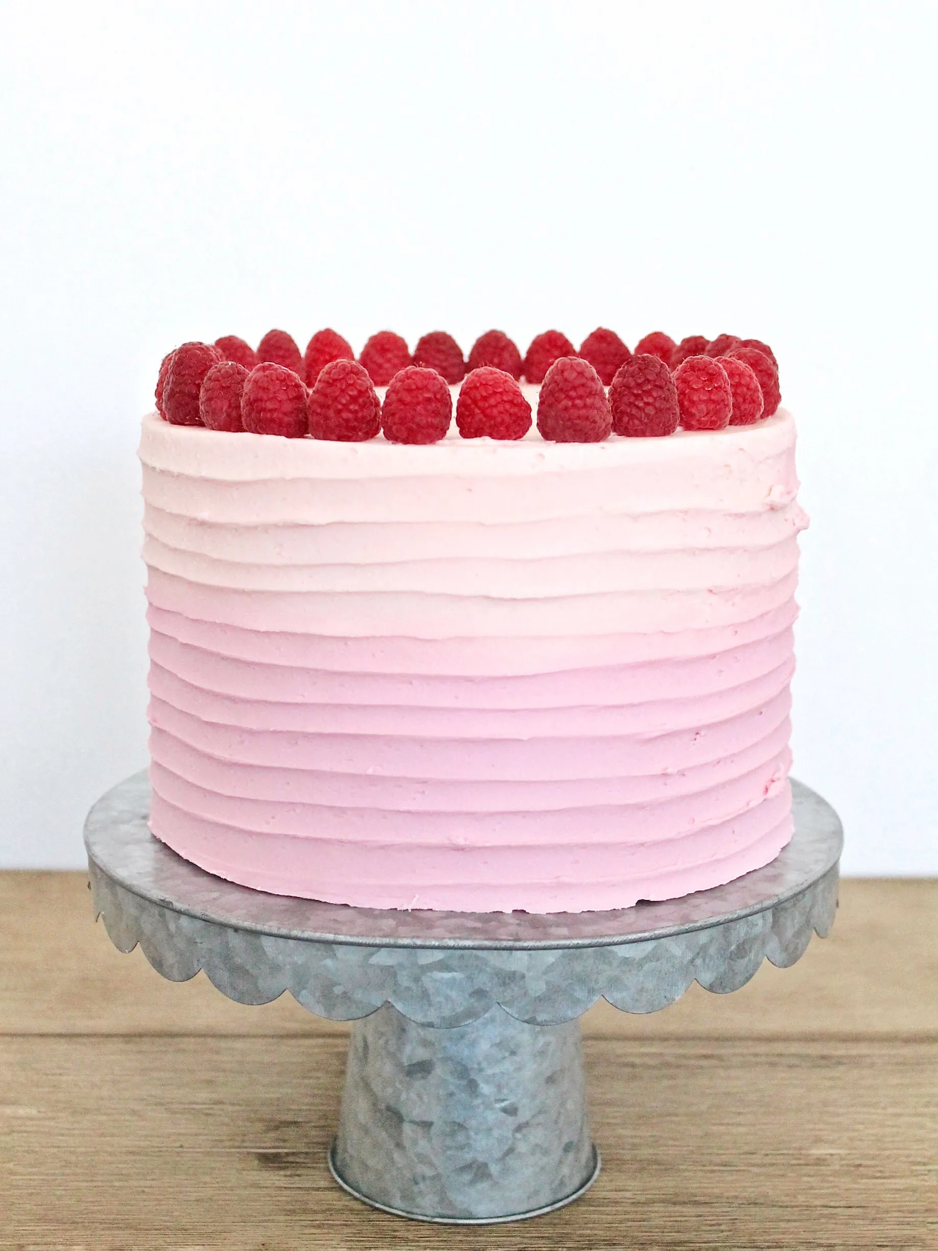 pink raspberry cake with buttercream frosting a birthday party for two